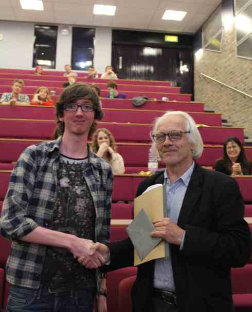 Liam Dorr receives an award for 'Joel's Big Party'. 